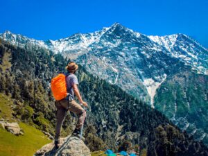 A man ready to climb a mountain peak